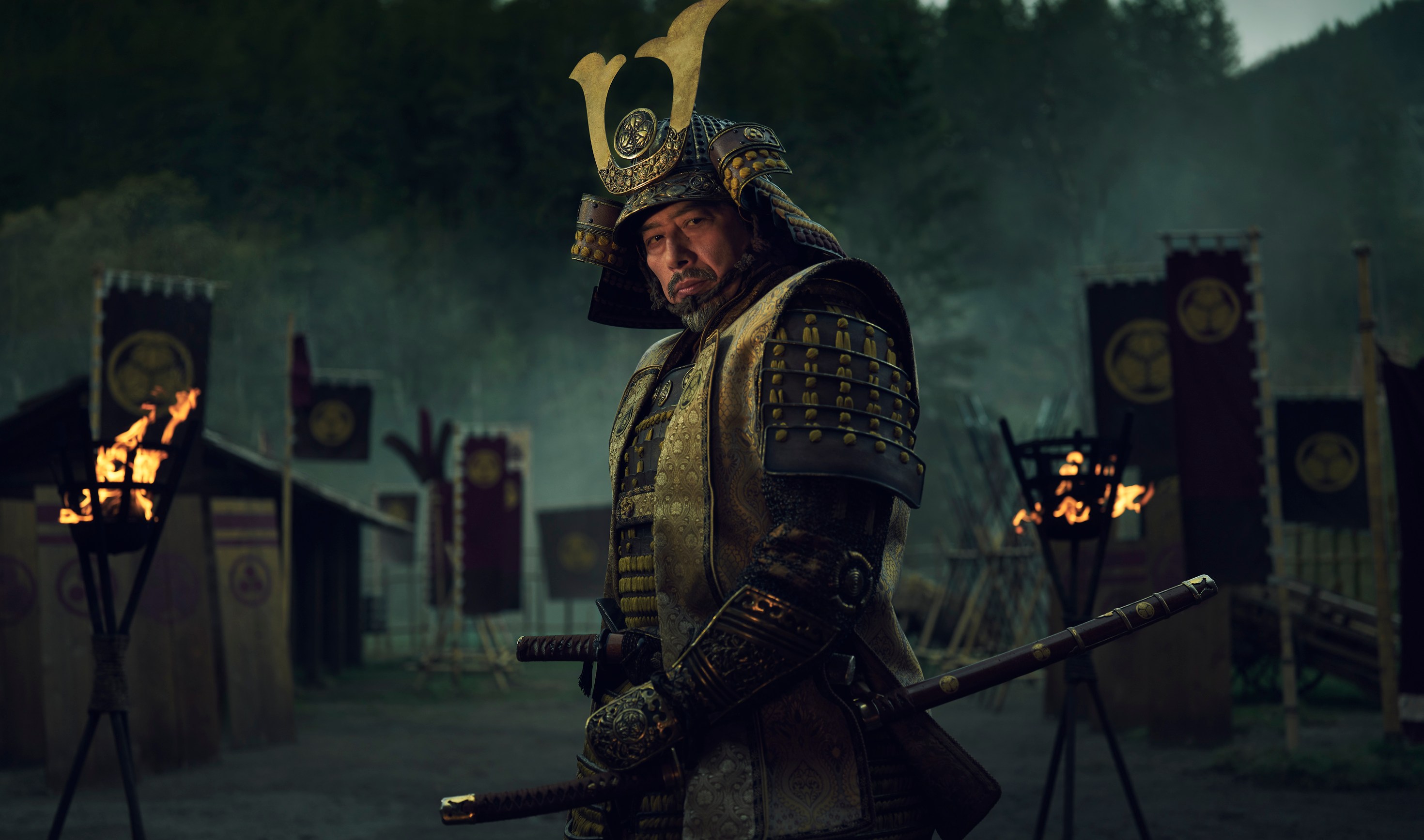 A samurai warrior dressed in traditional clothing and armor.