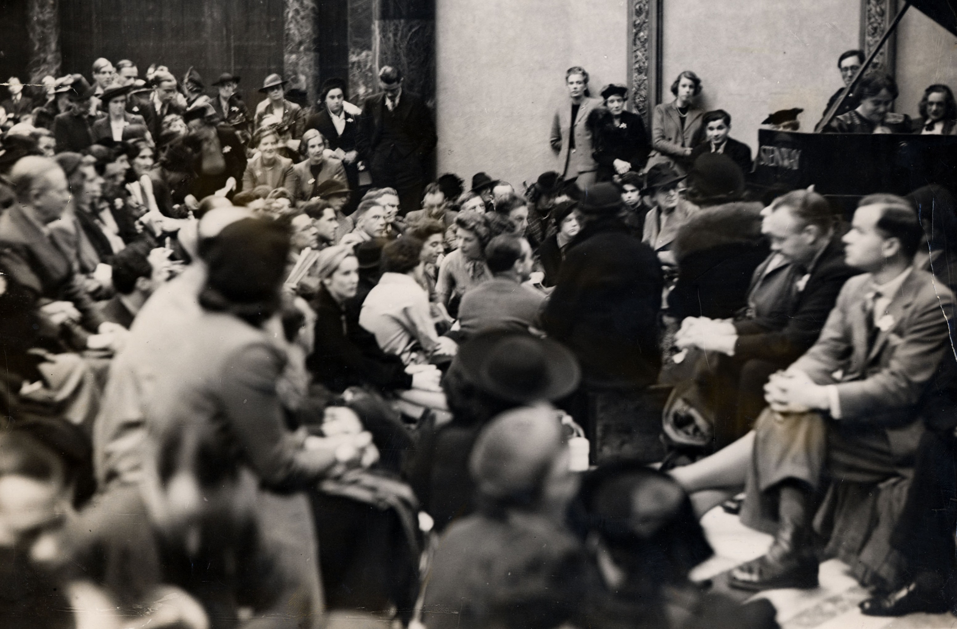 Office workers listening to a lunchtime concert at the National Gallery in 1939.